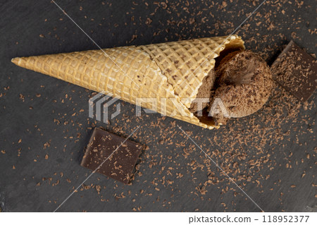 chocolate ice cream with chocolate chips on black slate 118952377
