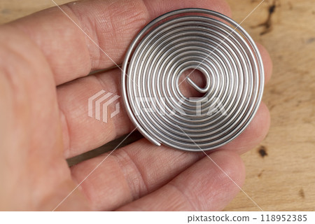 twisted like a spring solder for repair work with soldering 118952385