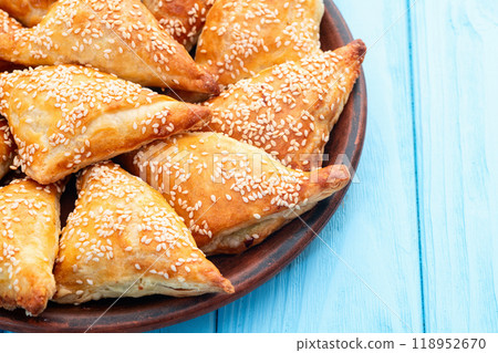 Homemade triangle puff pastry with meat on rustic background . Samosa 118952670