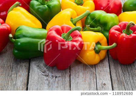 Fresh sweet bell pepper ( paprika ) photography red , green and yellow . Colorful vegetable . Top view Fresh sweet bell pepper ( paprika ) photography red , green and yellow . Colorful vegetable . Top view 118952680