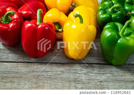 Fresh sweet bell pepper ( paprika ) photography red , green and yellow . Colorful vegetable . Top view Fresh sweet bell pepper ( paprika ) photography red , green and yellow . Colorful vegetable . Top view 118952681