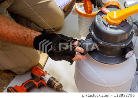 Assembling sand filter system tank equipment used to clean swimming pools 118952796