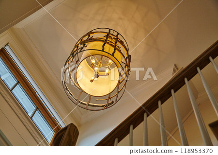 Elegant Ceiling Light Fixture in Modern Home Interior, Below View Elegant Ceiling Light Fixture in Modern Home Interior, Below View 118953370