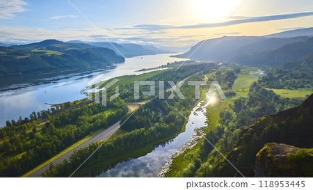 Aerial View of Columbia River Meandering Through Lush Valley at Golden Hour Aerial View of Columbia River Meandering Through Lush Valley at Golden Hour 118953445