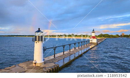 Aerial View of Lighthouses on North Pier with Rainbow at Sunset 118953542