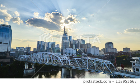 Aerial View of Nashville Skyline at Golden Hour with River and Bridge 118953665