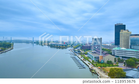 Aerial View of Toledo Riverfront with Suspension Bridge and Skyscrapers 118953676