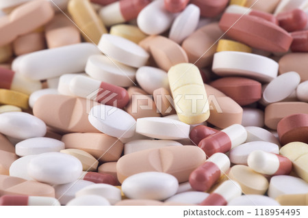 Heap of medicine pills or dietary supplements macro shot Heap of medicine pills or dietary supplements macro shot 118954495