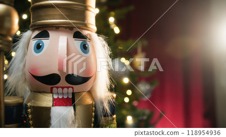 Nutcracker under Christmas tree with copy space  118954936