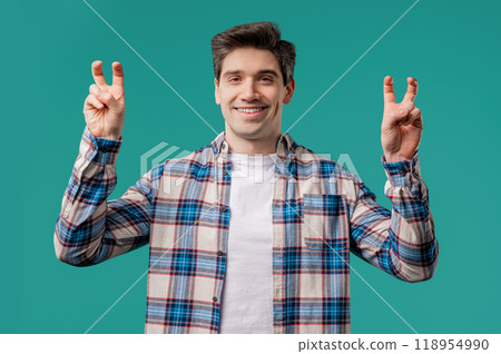 Sarcastic mature man with hands two fingers air quotes gesture on blue, sarcasm 118954990