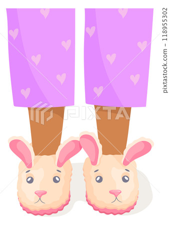 Kid legs in cute fluffy slippers. Bunny shoes 118955302