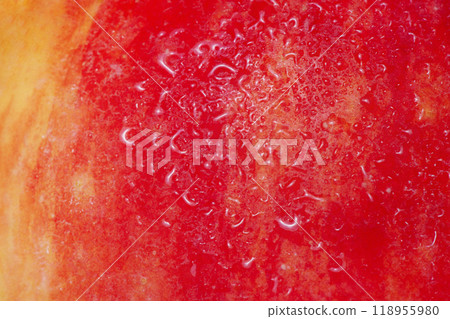 Red and yellow apple texture with water drops as background. Red and yellow apple texture with water drops as background. 118955980