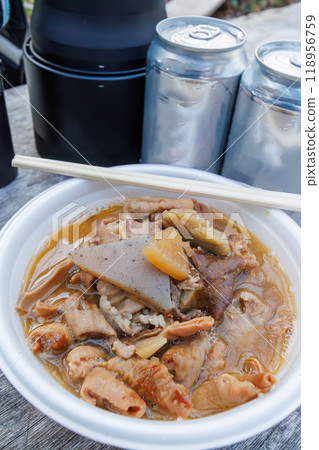 Delicious stewed offal and canned beer purchased at a restaurant on the shore of Lake Miyagase, as well as a camera and binoculars. Lake Miyagase, Kanagawa Prefecture - 2024 Delicious stewed offal and canned beer purchased at a restaurant on the shore of Lake Miyagase, as well as a camera and binoculars. Lake Miyagase, Kanagawa Prefecture - 2024 118956759