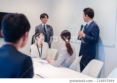 Business people working in a bright and clean office Business people working in a bright and clean office 118957844