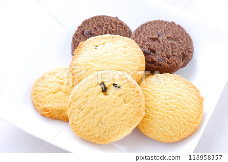 Delicious cookies served on a white plate Delicious cookies served on a white plate 118958357