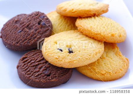 Delicious cookies served on a white plate Delicious cookies served on a white plate 118958358