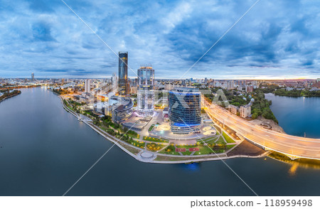 Yekaterinburg city and pond aerial panoramic view at summer or early autumn sunset. Night city in the early autumn or summer. 118959498
