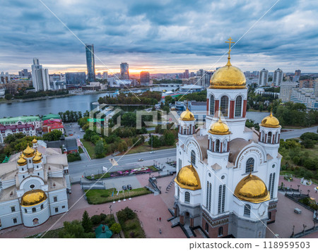 Summer Yekaterinburg, Temple on Blood and Church of St Nicholas in sunset. Aerial view of Yekaterinburg, Russia. Translation of text on the temple: Honest to the Lord is the death of His saints 118959503