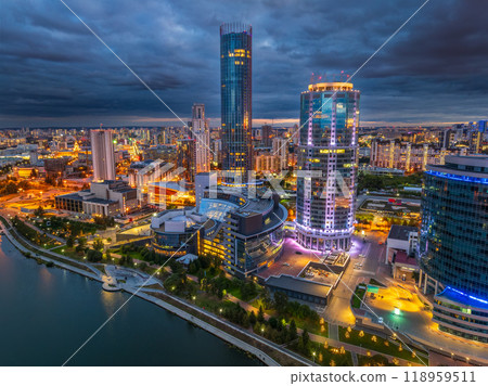 Yekaterinburg city and pond aerial panoramic view at summer or early autumn night. Night city in the early autumn or summer. Yekaterinburg city and pond aerial panoramic view at summer or early autumn night. Night city in the early autumn or summer. 118959511