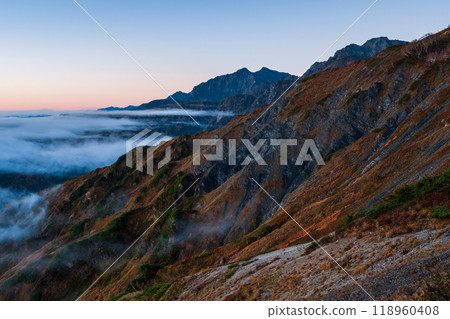 Autumn climbing of Mt. Karamatsu: The Tateyama mountain range at dawn Autumn climbing of Mt. Karamatsu: The Tateyama mountain range at dawn 118960408