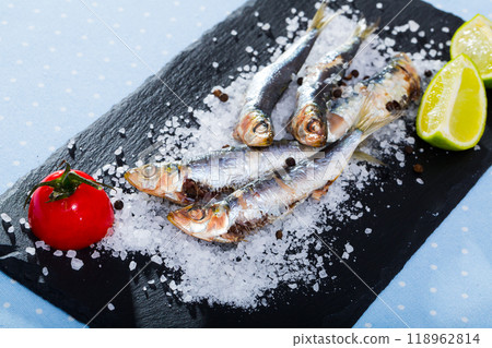 Slate of baked in oven anchovies Slate of baked in oven anchovies 118962814