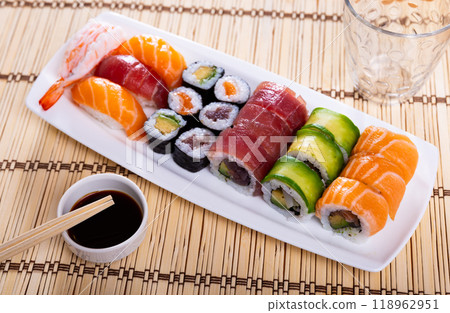 Set of sushi rolls and nigiri with salmon, tuna, avocado and shrimp Set of sushi rolls and nigiri with salmon, tuna, avocado and shrimp 118962951