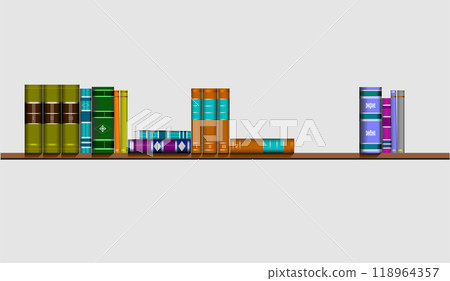 Books standing and lying on a long wooden shelf 118964357