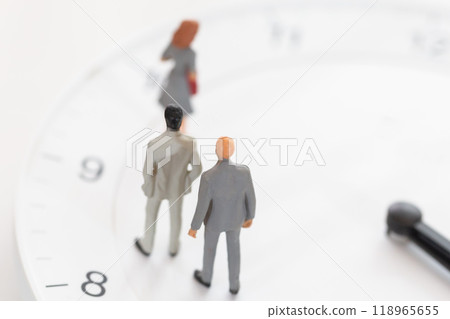 Clock face and male doll in business suit - image of working hours and career Clock face and male doll in business suit - image of working hours and career 118965655