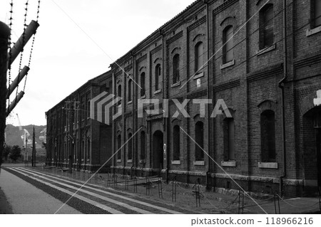 Red Brick Warehouses and Barbed Wire Monochrome 118966216
