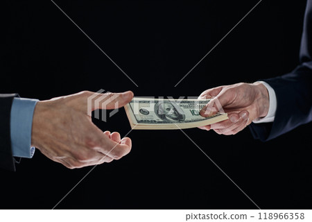 exchange of money cards between businessmen, close-up exchange of money cards between businessmen, close-up 118966358