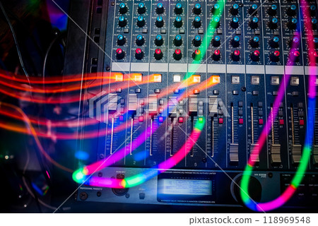 professional music equipment to create and mix music with volume levels and tvolume of music closeup professional music equipment to create and mix music with volume levels and tvolume of music closeup 118969548