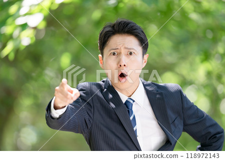 Angry businessman 118972143
