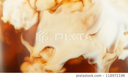 Macro Shot of Milk Mixing with Coffee Drink in Detail. 118972196