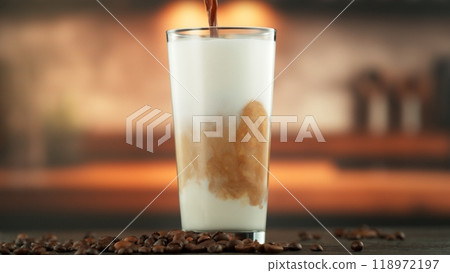 Pouring Coffee into Frothed Milk. 118972197