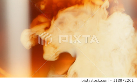 Macro Shot of Milk Mixing with Coffee Drink in Detail. Macro Shot of Milk Mixing with Coffee Drink in Detail. 118972201