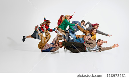 Group of super excited and active shoppers, people running forward to get the best deals, showing their desperation for discounts Group of super excited and active shoppers, people running forward to get the best deals, showing their desperation for discounts 118972281