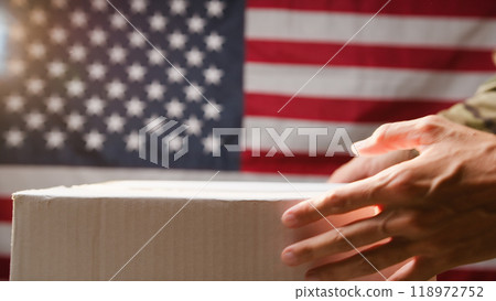 soldier carries ballot box for the election day soldier carries ballot box for the election day 118972752