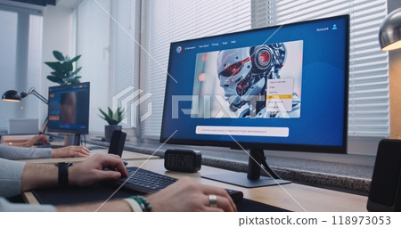 Adult man in headphones enters prompt in AI image generator on computer Adult man in headphones enters prompt in AI image generator on computer 118973053