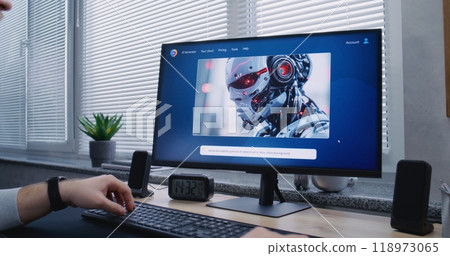 Adult man types prompt in artificial intelligence chatbot on PC. 118973065