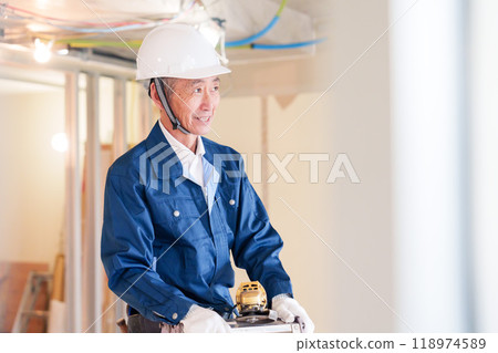 Carpenters and craftsmen working on site Carpenters and craftsmen working on site 118974589