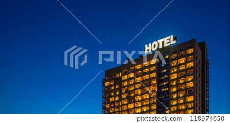 Modern hotel building at dusk, city accommodation, high-rise with illuminated windows, rooftop sign, urban travel lodging destination, evening hospitality industry structure Modern hotel building at dusk, city accommodation, high-rise with illuminated windows, rooftop sign, urban travel lodging destination, evening hospitality industry structure 118974650