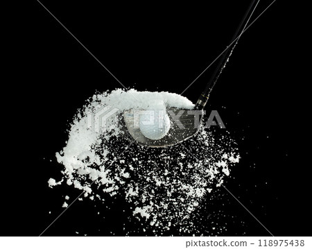 Golf Ball golfer hit snow to explode and splatter. Sand wedge golf dick ball from snow field and snow fly in air. Night black background isolated 118975438
