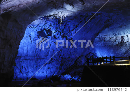 The inside of Akiyoshi Cave, a special natural monument, illuminated in blue The inside of Akiyoshi Cave, a special natural monument, illuminated in blue 118976542