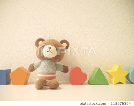 Teddy bear and building blocks Teddy bear and building blocks 118976594