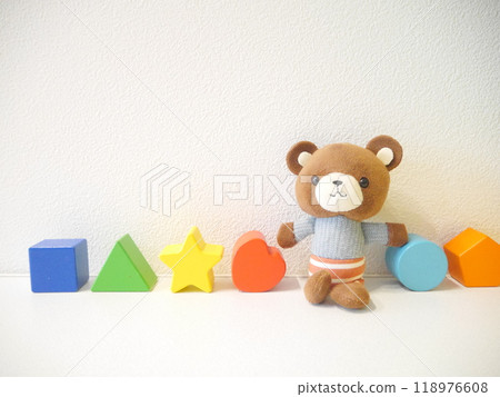 Teddy bear and building blocks Teddy bear and building blocks 118976608