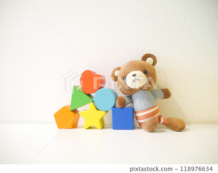 Teddy bear and building blocks Teddy bear and building blocks 118976634