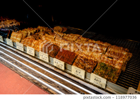 Karuizawa, Kitasaku-ku, Nagano, Japan - April 15, 2024: Senbei is Japanese street food Karuizawa, Kitasaku-ku, Nagano, Japan - April 15, 2024: Senbei is Japanese street food 118977036