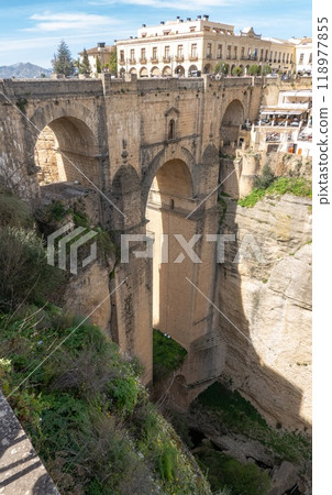 View over the bridge and canyon in Ronda, Andalusia, Spain. 118977855