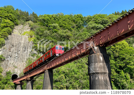 Iwato scenery Hyakueda iron bridge and red train Iwato scenery Hyakueda iron bridge and red train 118978070