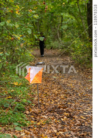 Orienteering. Control point Prism and electric composter for orienteering in the spring forest. 118978318